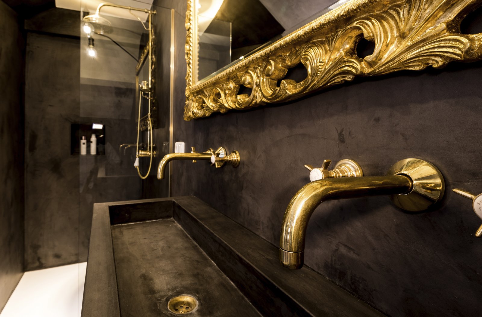 Second bathroom, brass taps and gilt mirror
