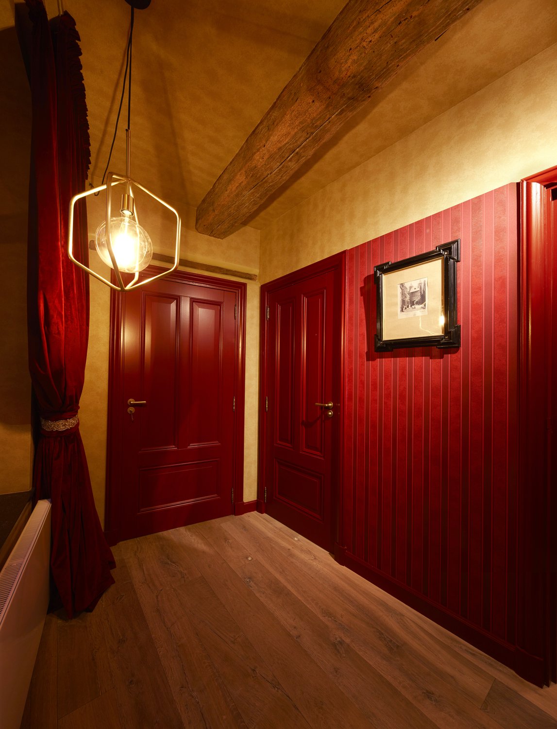 Hallway with red doors